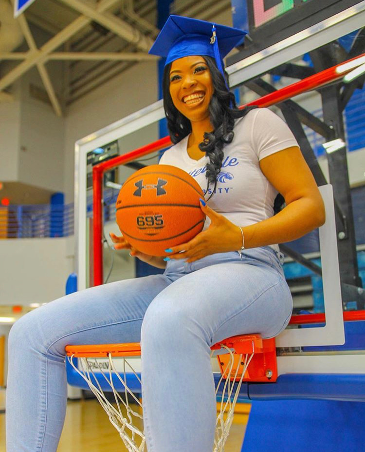 Chi Chi Madguebunam on Sitting on Basketball Hoop